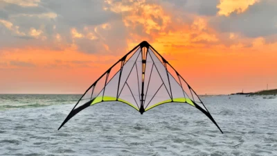 Synthesis Stunt Kite By Prism - Yellow Over Water
